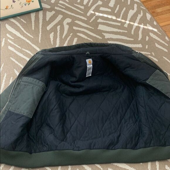 Carhartt Distressed RN#14806
J130 MOS Green Hooded Chore Workwear Coat Sz XLT - Picture 9 of 17